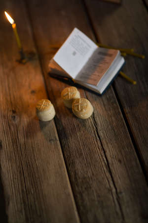 Prosfora from the Orthodox Church and a burning candle