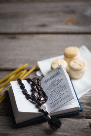 Prosfora from the Orthodox Church and a burning candleの写真素材