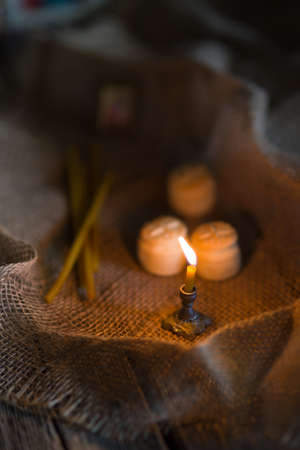 Prosfora from the Orthodox Church and a burning candleの写真素材