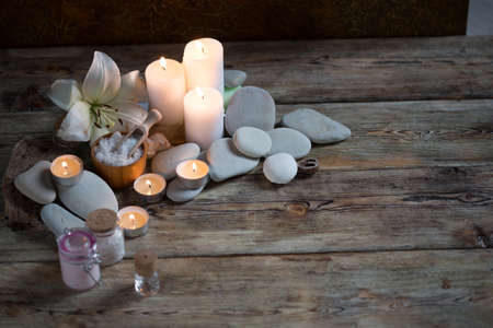 Beautiful composition of spa treatment on white wooden table の写真素材