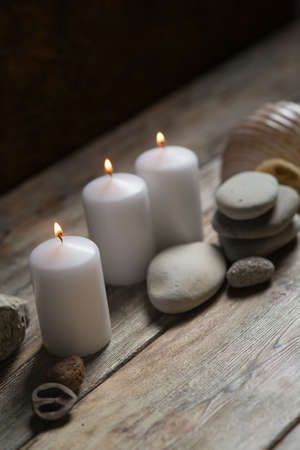 Beautiful composition of spa treatment on white wooden table の写真素材