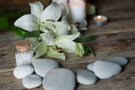 Beautiful composition of spa treatment on white wooden table 