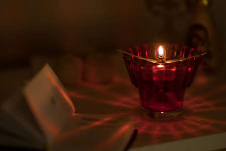 Burning lamp in a room with orthodox iconsの写真素材