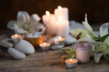 Beautiful composition of spa treatment on white wooden table 