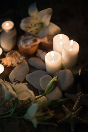 Beautiful composition of spa treatment on white wooden table の写真素材