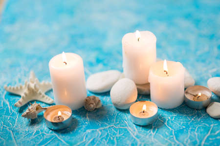 Beautiful composition of spa treatment on white wooden table の写真素材