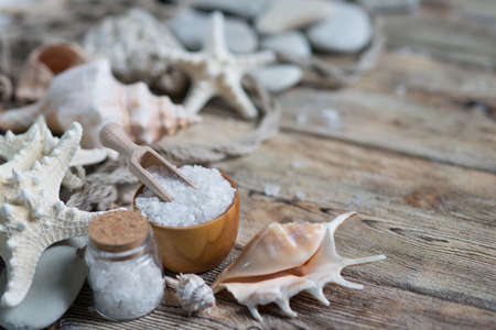 Beautiful composition of spa treatment on white wooden table の写真素材
