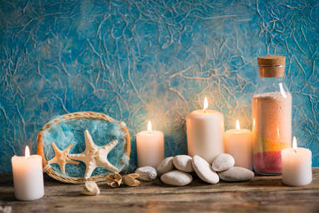 Beautiful composition of spa treatment on white wooden table の写真素材