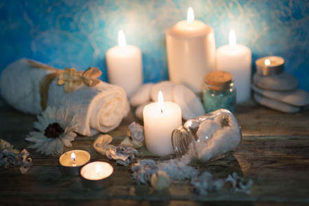 Beautiful composition of spa treatment on white wooden table の写真素材