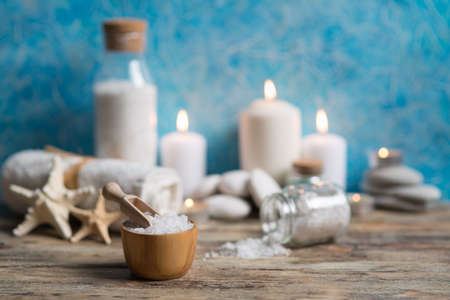 Beautiful composition of spa treatment on white wooden table の写真素材