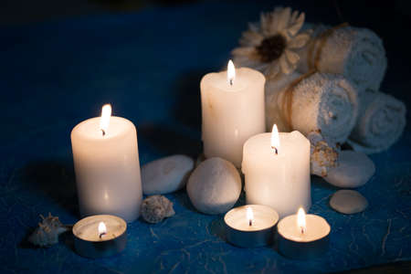 Beautiful composition of spa treatment on white wooden table の写真素材