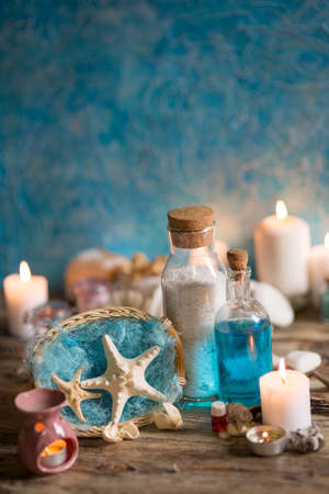 Beautiful composition of spa treatment on white wooden table の写真素材