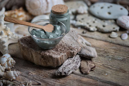 Beautiful composition of spa treatment on white wooden table の写真素材