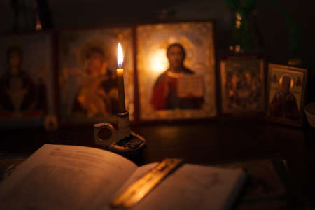 Burning lamp in a room with orthodox iconsの写真素材