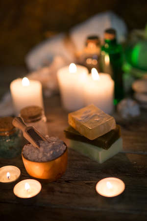Beautiful composition of spa treatment on white wooden table の写真素材