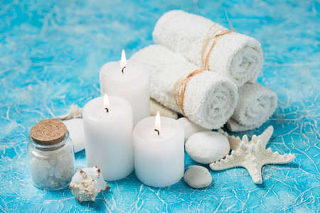 Beautiful composition of spa treatment on white wooden table の写真素材