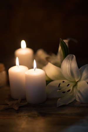 Beautiful composition of spa treatment on white wooden table の写真素材