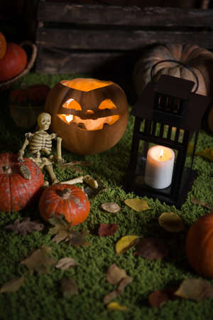 Pumpkin and candy on the table in the celebration of Halloweenの写真素材
