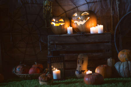 Pumpkin and candy on the table in the celebration of Halloween
