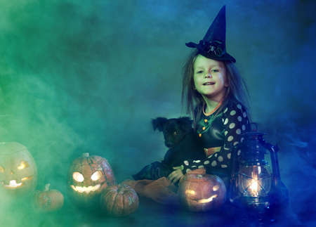 Two girls on Halloween dressed witchesの写真素材