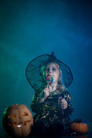 Baby in Halloween costumes, girl two years oldの写真素材