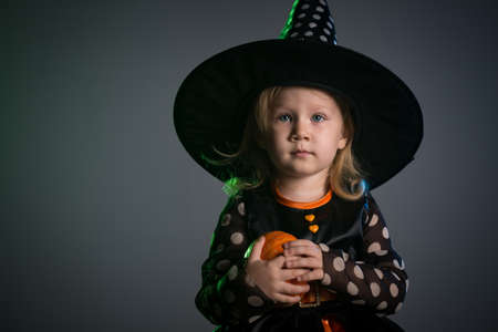 Baby in Halloween costumes, girl two years oldの写真素材