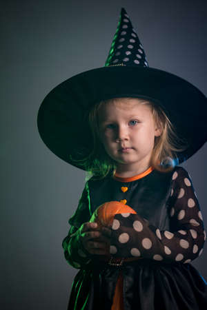 Baby in Halloween costumes, girl two years oldの写真素材