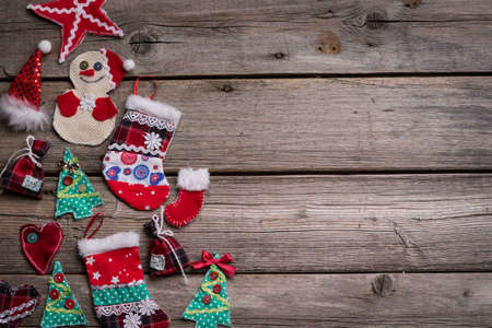 Christmas background on the fear of wooden boards, handmade toys