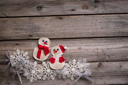 Christmas background on the fear of wooden boards, handmade toysの写真素材