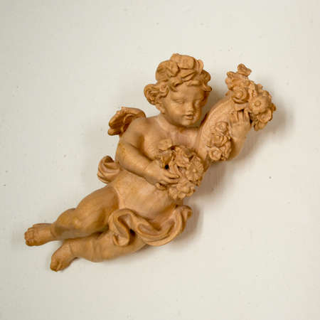 Beautiful Wooden Antique Angel on White Backgroundの写真素材