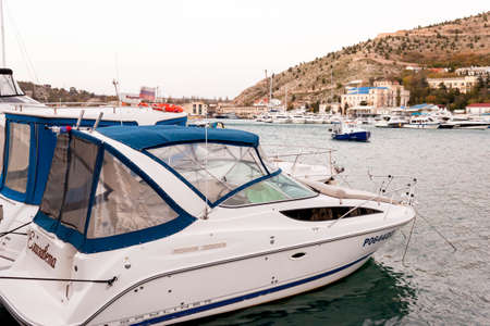 Balaklava, Sevastopol, Crimea, Russia - October 28, 2018: beautiful old marina and harbor View with Yachts, boats and embankment with old buildings in the bay of Balaclava on Black Sea.のeditorial素材
