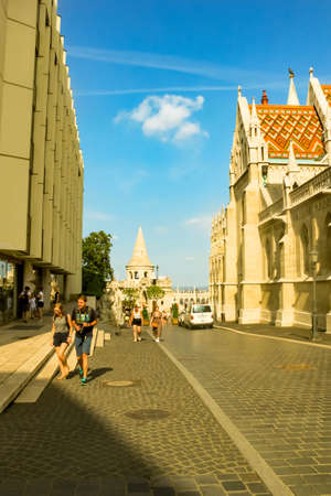BUDAPEST, HUNGARY 29 JULY 2019: Roman Catholic Matthias Cathedral, Church of Our Lady of Buda in front of Fisherman's Bastionのeditorial素材