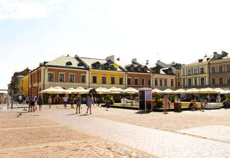 ZAMOSC, POLAND - JULY 28, 2019: colorful renaissance houses at Market Square of historical city center of Zamosc UNESCO World Heritageのeditorial素材