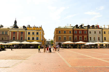 ZAMOSC, POLAND - JULY 28, 2019: colorful renaissance houses at Market Square of historical city center of Zamosc UNESCO World Heritageのeditorial素材