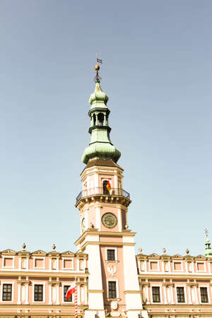 ZAMOSC, POLAND - JULY 28, 2019: Beautiful ancient Town Hall at Market Square of historical city center of Zamosc UNESCO World Heritage List site.のeditorial素材