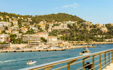 NICE, FRANCE - AUGUST 6, 2019: Beautiful above view on old harbour with yachts, sailing boats in Nice Provence Cote D Azur. Natural background view. Mediterranean tourist destination, French riviera.のeditorial素材
