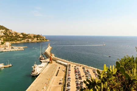 NICE, FRANCE - AUGUST 6, 2019: Beautiful above view on old harbour with yachts, sailing boats in Nice Provence Cote D Azur. Natural background view. Mediterranean tourist destination, French riviera.のeditorial素材