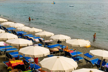 VARAZZE, ITALY- AUGUST 5, 2019: Beautiful beach of coast of Liguria and Ligurian sea on natural background view. Text copy space. Italian sea, beach conceptのeditorial素材