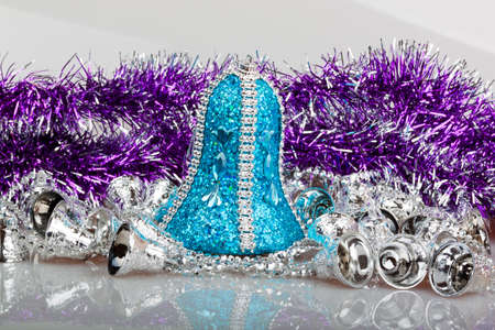 bells with purple garlandの写真素材