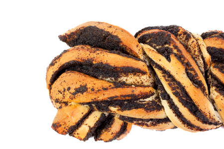 plait with poppy seeds isolated on white backgroundの写真素材