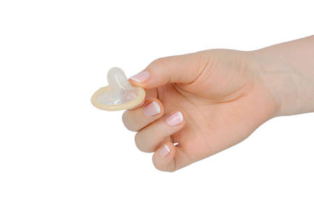 female hand holding condom isolated on white 