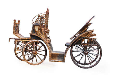 vintage metal carriage isolated on white backgroundの写真素材