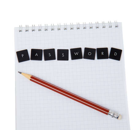 Notebook and pencil with the word password on a white background
