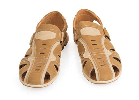 Man's brown shoes isolated on a white backgroundの写真素材