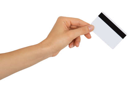 Female hand holding a bank card isolated on white background Female hand holding a bank card isolated on white background