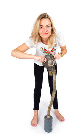 Young woman in embroidery with respirator isolated on white backgroundの写真素材