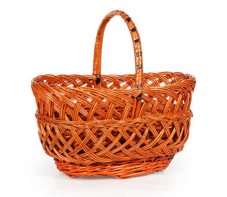 Empty wicker basket isolated on white backgroundの写真素材