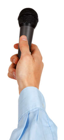 Man's hand in a blue shirt holding a microphone isolated on white backgroundの写真素材