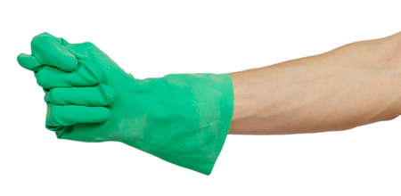 Hand in green rubber glove shows fig sign isolated on a white background
