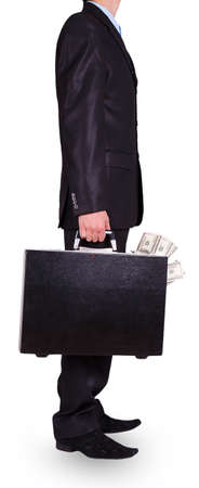 Man in a black suit with black case on white backgroundの写真素材